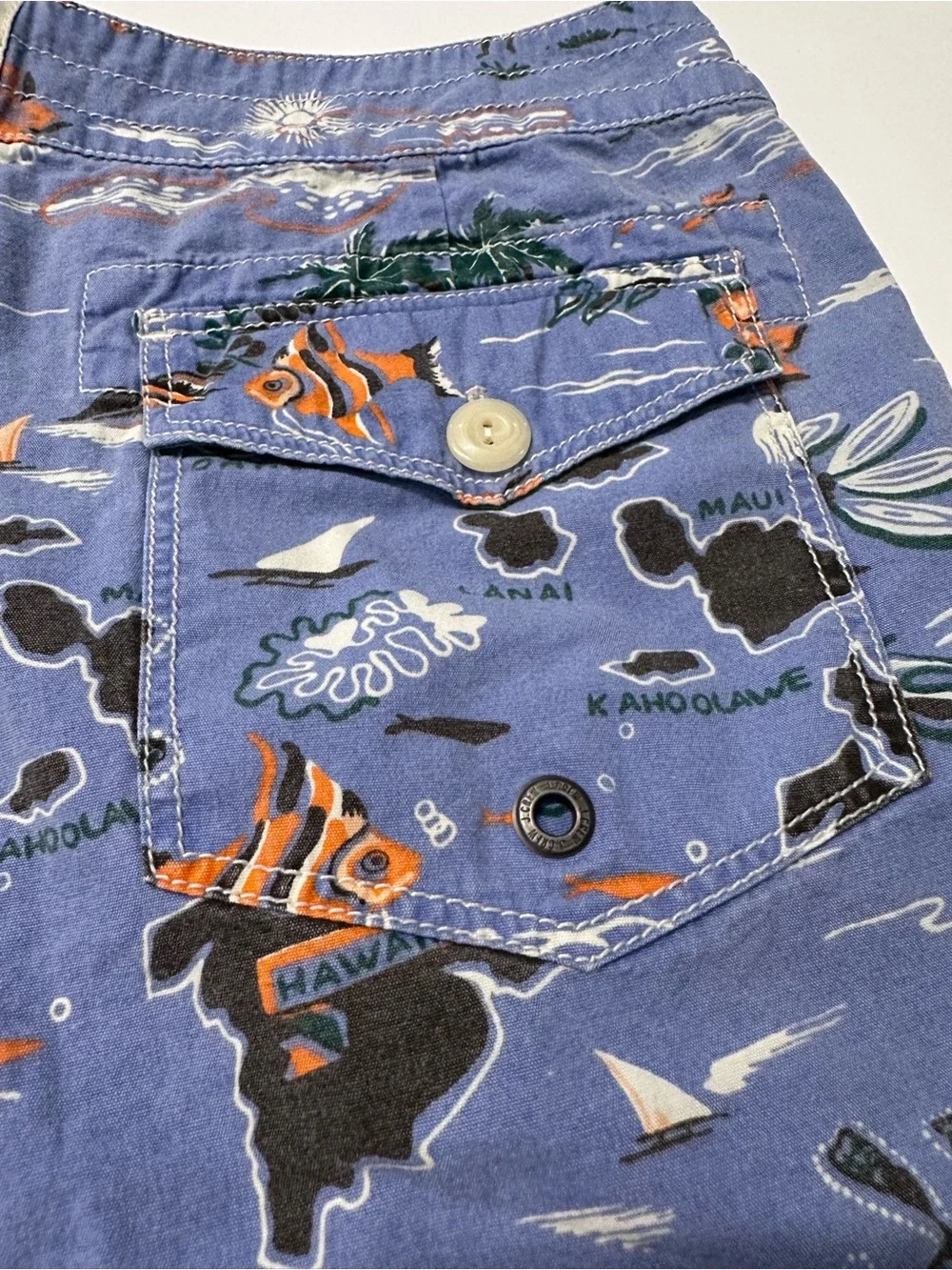 J. Crew Blue Hawaiian Map Print Swim Trunks with Orange Floral Accents